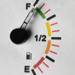 Mechanic in West London explaining wrong fuel recovery myths to a driver.