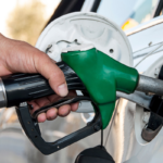 Fleet of delivery vans parked outside a depot in West London.