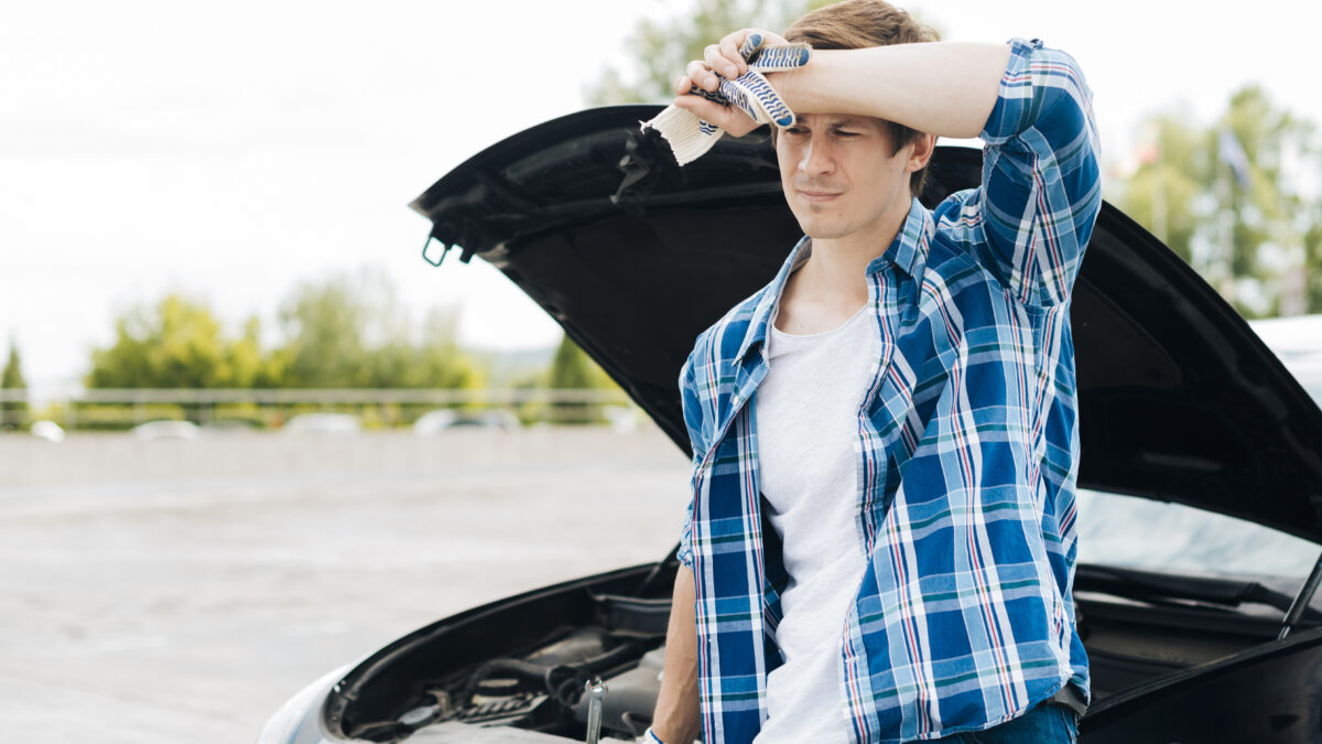 Mobile wrong fuel recovery van assisting a driver on the M25 motorway in South East England.