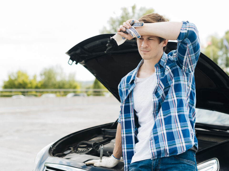 Mobile wrong fuel recovery van assisting a driver on the M25 motorway in South East England.