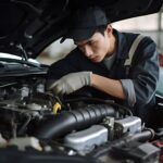 Driver at Kensington petrol station calling for wrong fuel recovery after misfuelling car.