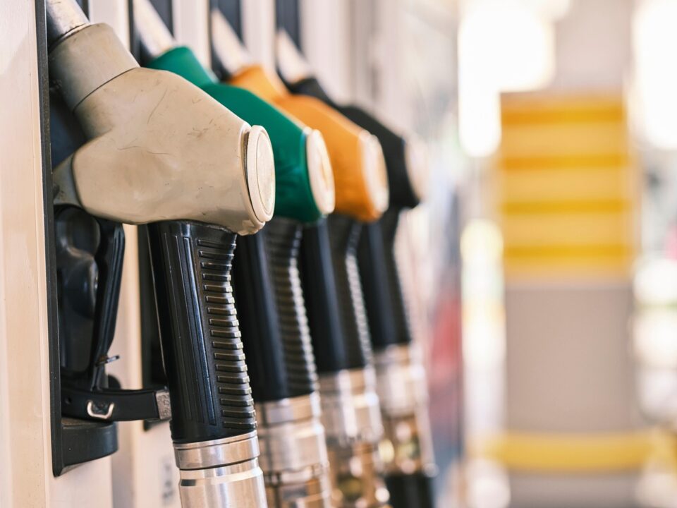 Wrong Fuel Doctor draining petrol from a diesel car on roadside in emergency situation