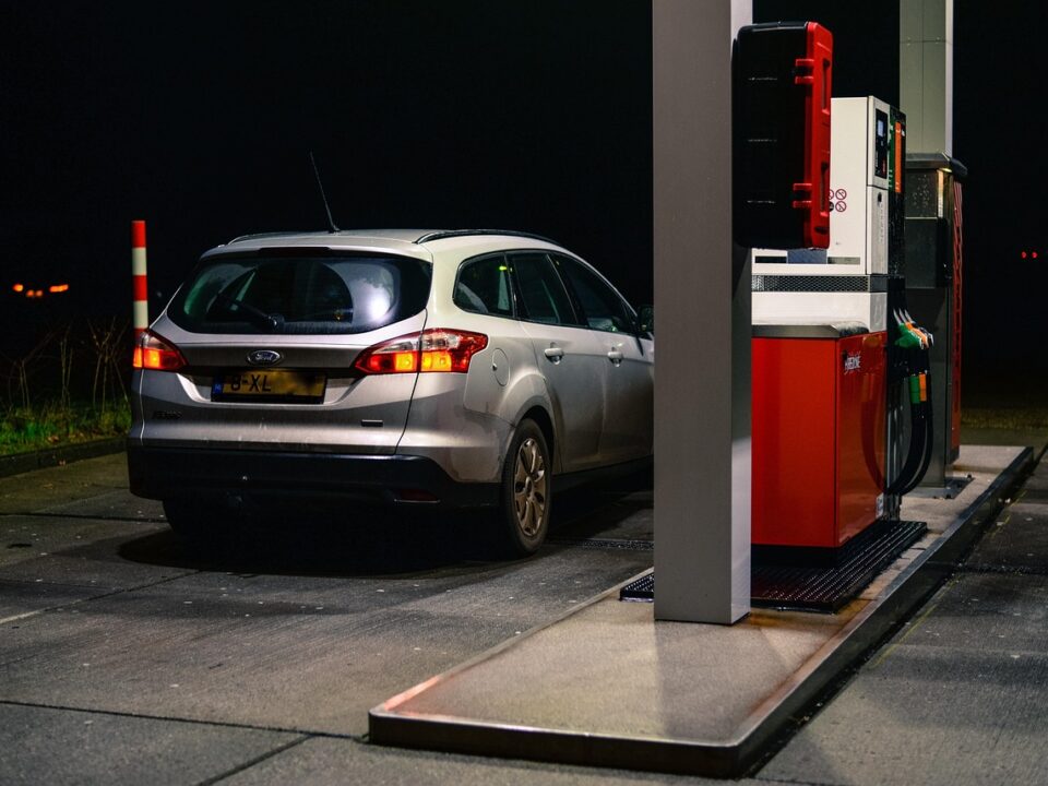 24/7 wrong fuel rescue service technician draining fuel at night roadside