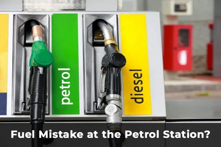 petrol and diesel fuel pumps at petrol station showing common wrong fuel mistake in UK