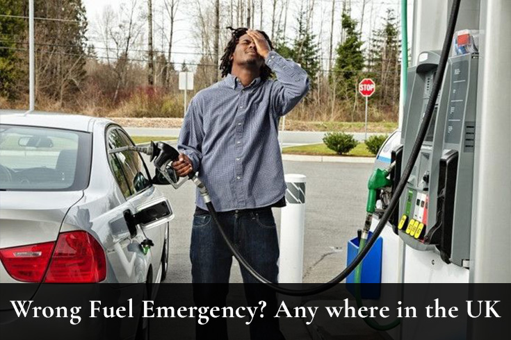 driver at petrol station realising wrong fuel mistake emergency in UK while holding fuel pump